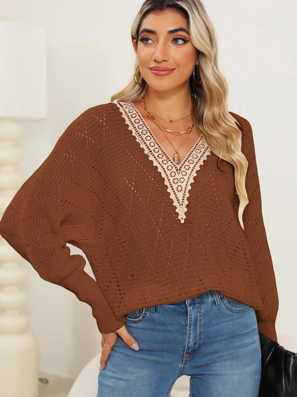 Autumn and winter hollowed out woven sweater with lace V-neck and batball sleeves