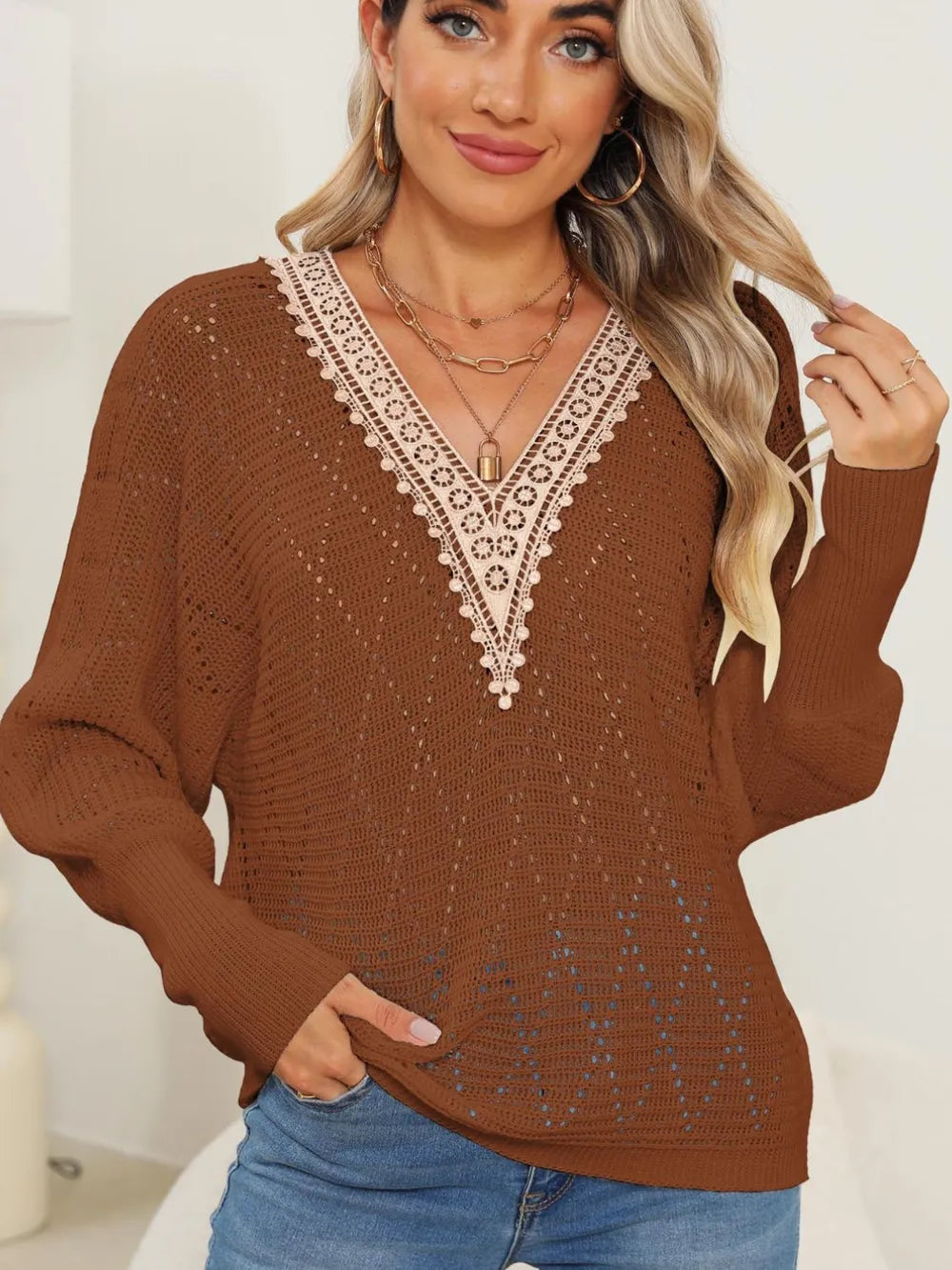Autumn and winter hollowed out woven sweater with lace V-neck and batball sleeves