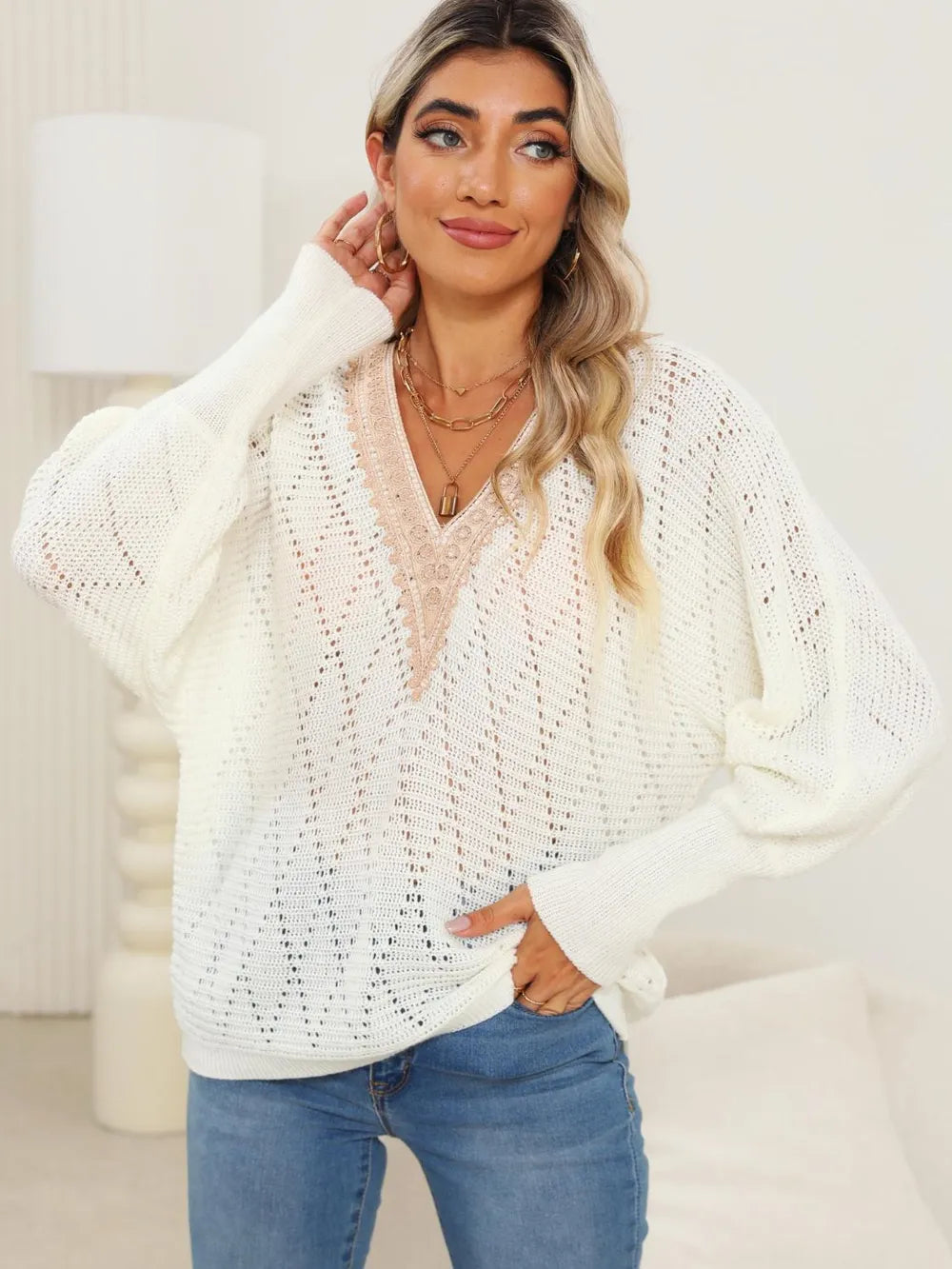 Autumn and winter hollowed out woven sweater with lace V-neck and batball sleeves